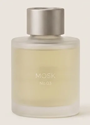 Recharge MOSK No.03, flacon en verre dépoli à la teinte jaune pâle.